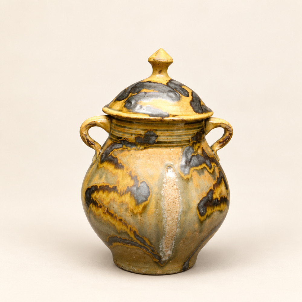 Yellow and gray two-handled lidded ceramic jar